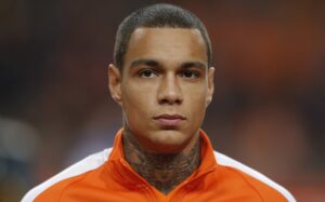 Netherlands' Gregory van der Wiel lines up prior to the Euro 2016 group A qualifying round soccer match between the Netherlands and Latvia at ArenA stadium in Amsterdam, Netherlands, Sunday, Nov. 16, 2014. (AP Photo/Peter Dejong)